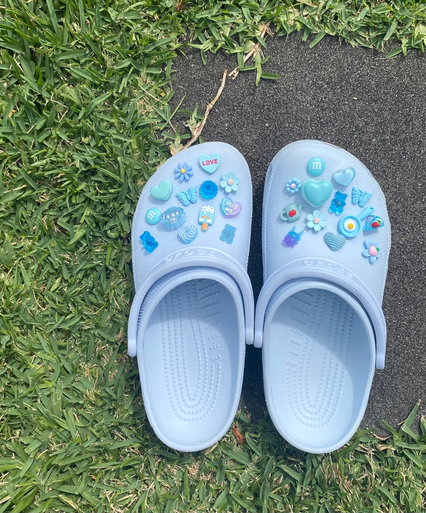 Blue crocs best sale with charms